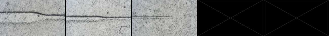 Close-up of a 3D printed microfluidic channel that steps down from 500 microns to 150 microns. At 150 microns, the channel geometry is barely distinguishable.